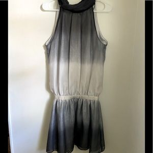 High-end boutique chiffon sleeveless black and white dress.